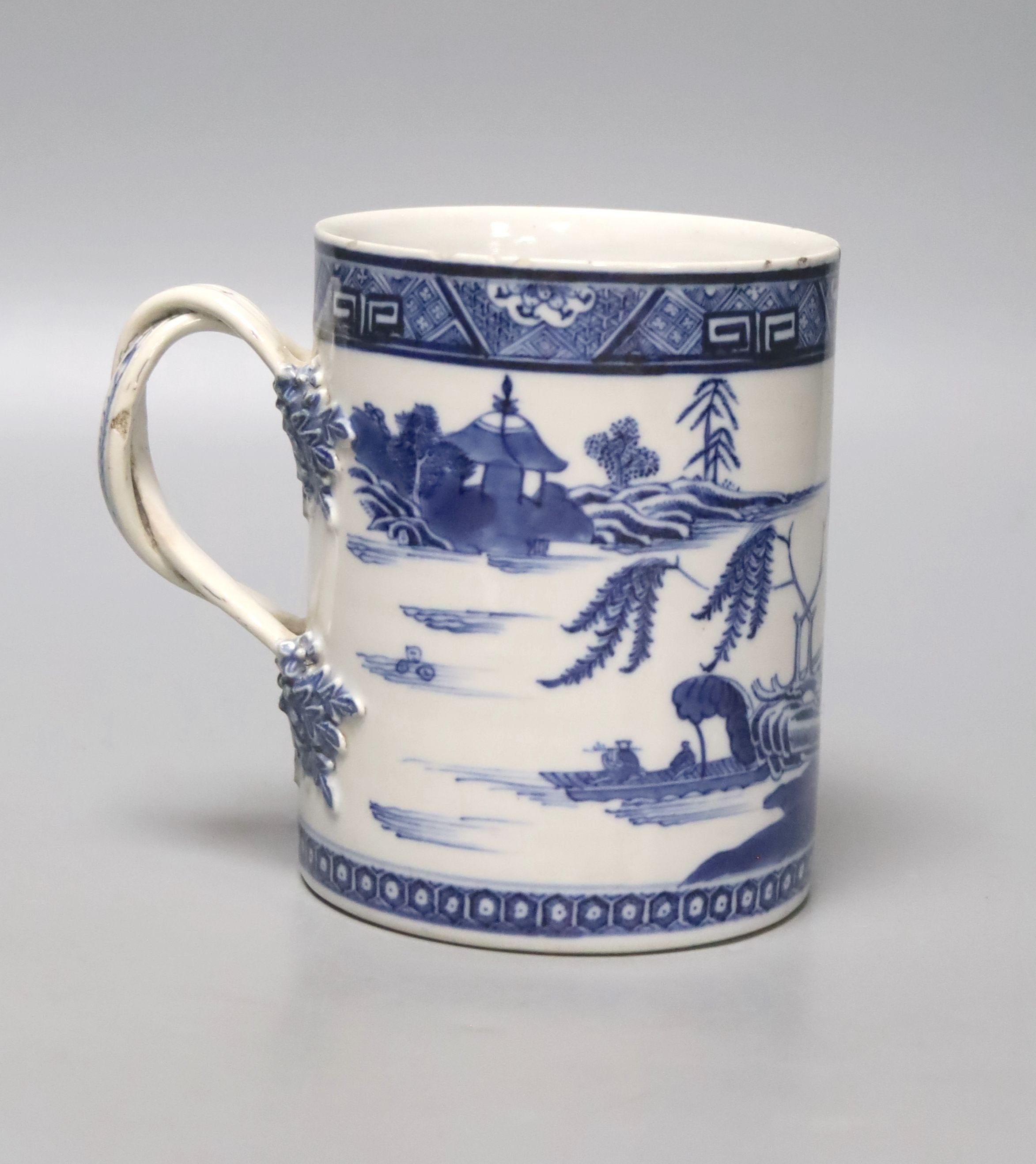 A late 18th century Chinese export blue and white cylindrical mug, with entwined handle, 13cm